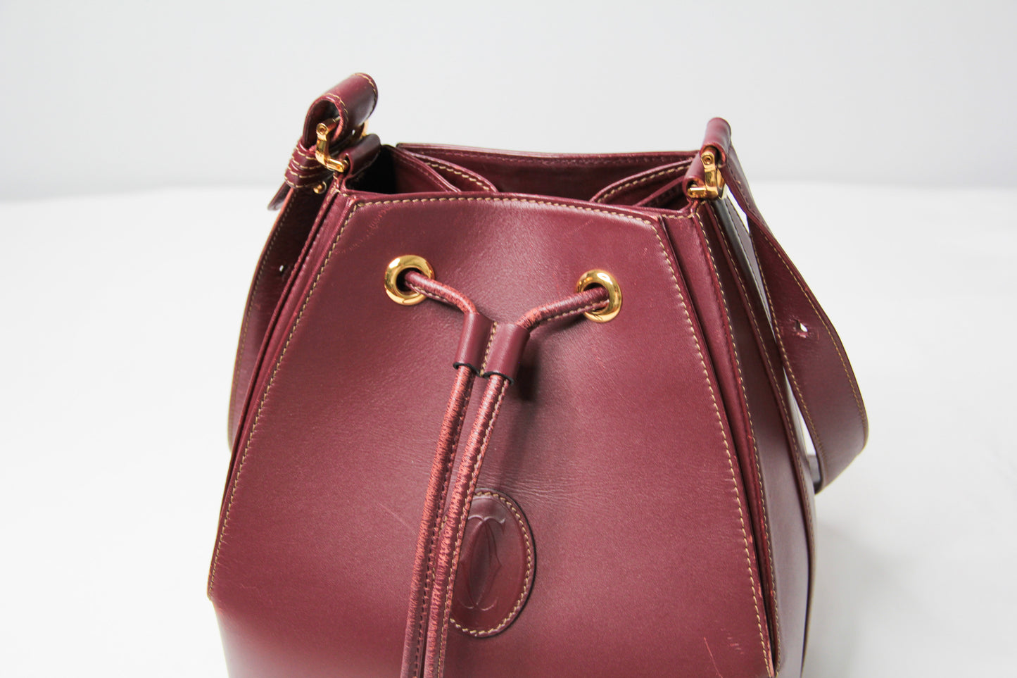 Must de Cartier Drawstring Shoulder Bag Bordeaux Leather