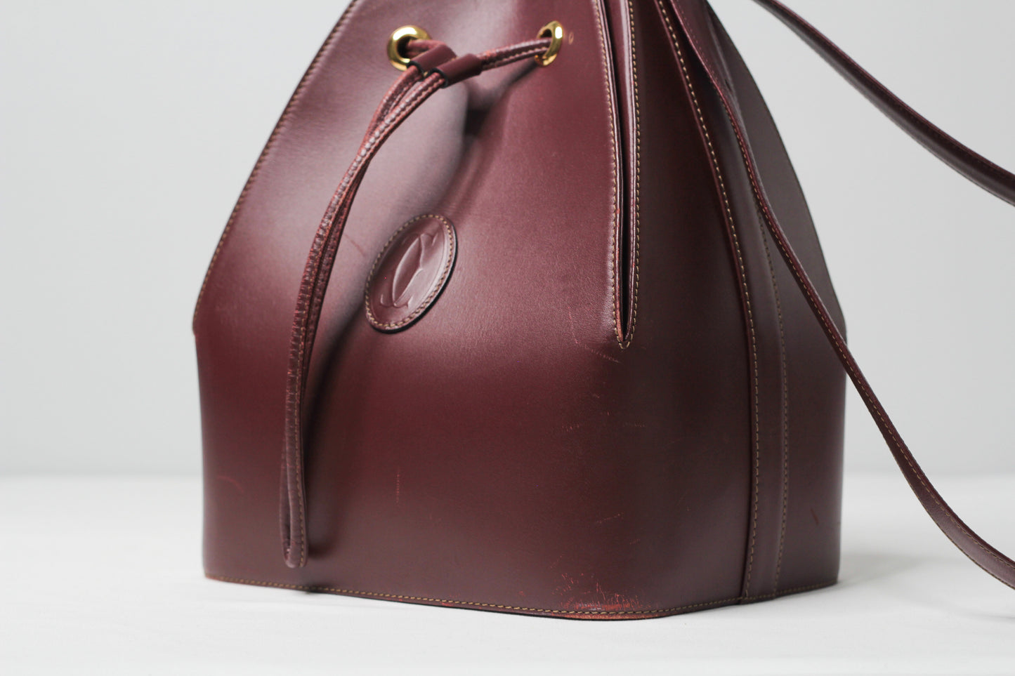 Must de Cartier Drawstring Shoulder Bag Bordeaux Leather