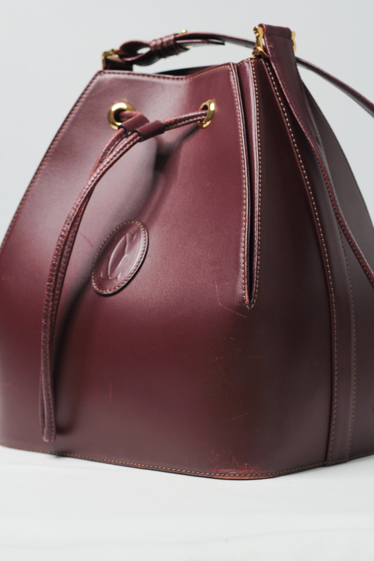 Must de Cartier Drawstring Shoulder Bag Bordeaux Leather